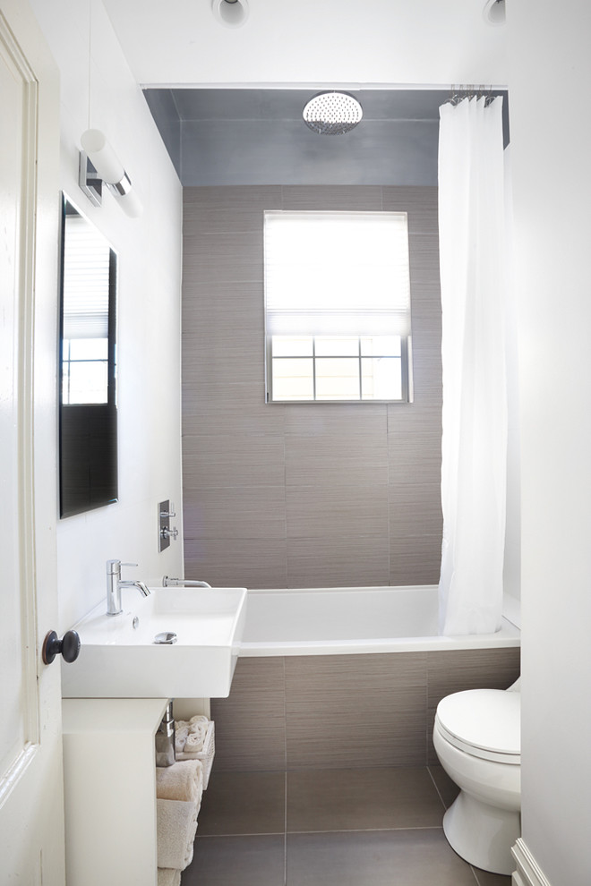 Bathroom - contemporary brown tile bathroom idea in San Francisco with a vessel sink and open cabinets