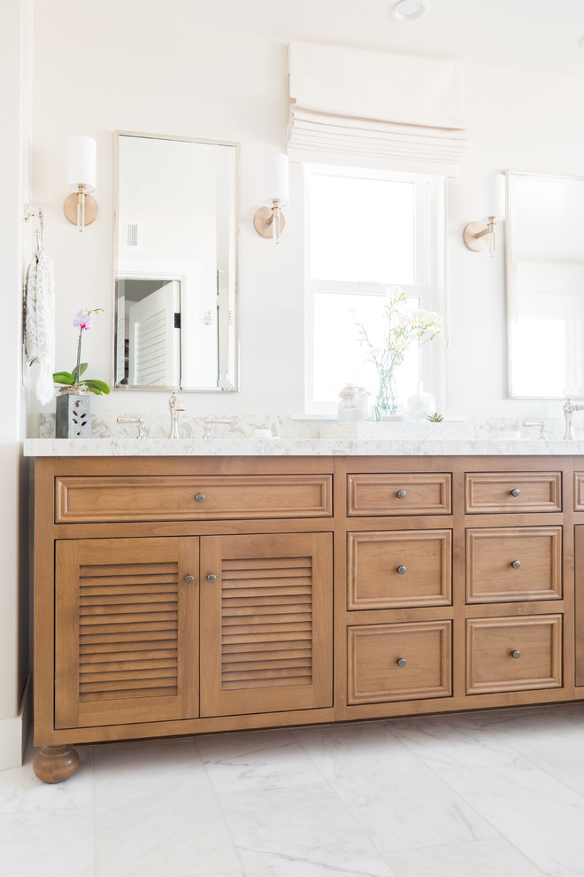 Inspiration for a transitional master bathroom remodel in Santa Barbara with louvered cabinets and brown cabinets