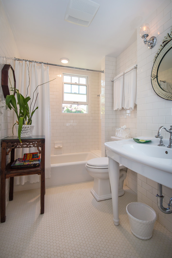 Inspiration for a mid-sized timeless 3/4 white tile bathroom remodel in Hawaii with a pedestal sink, a one-piece toilet and white walls