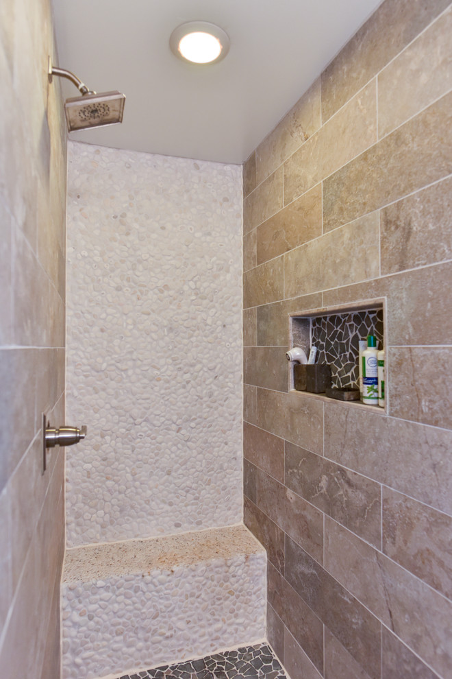 This is an example of a large contemporary ensuite bathroom in DC Metro with freestanding cabinets, dark wood cabinets, an alcove shower, a two-piece toilet, beige tiles, pebble tiles, white walls, ceramic flooring, an integrated sink, engineered stone worktops, beige floors and an open shower.