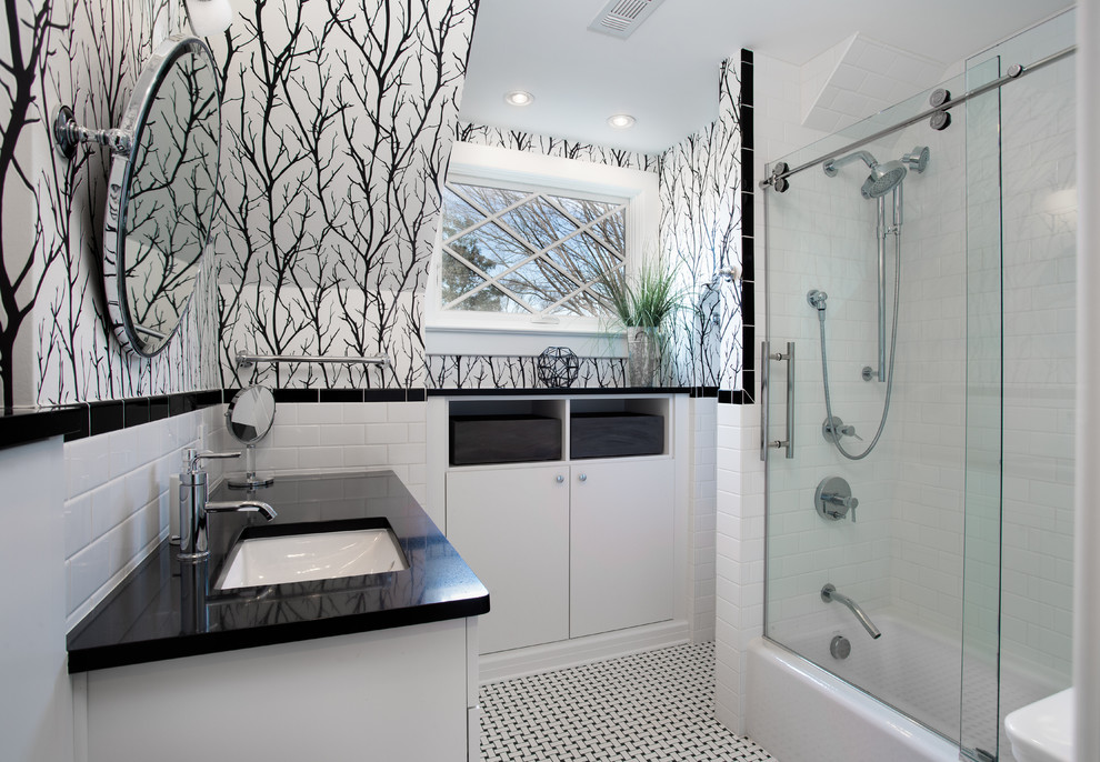 Medium sized bathroom in DC Metro with recessed-panel cabinets, white cabinets, an alcove shower, white tiles, metro tiles, multi-coloured walls, ceramic flooring, a submerged sink, engineered stone worktops, multi-coloured floors, a sliding door and black worktops.