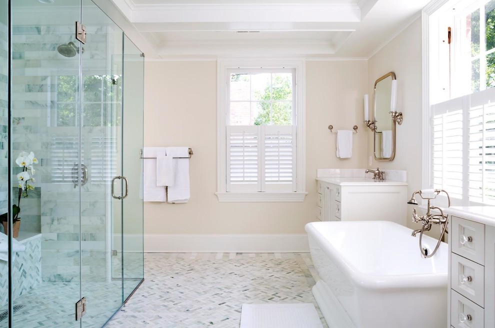 Bathroom - large transitional master white tile mosaic tile floor bathroom idea in DC Metro with recessed-panel cabinets, white cabinets, quartzite countertops, beige walls and an integrated sink