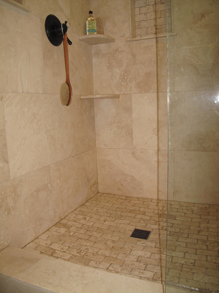 Bathroom - mid-sized traditional master beige tile and ceramic tile ceramic tile bathroom idea in Orange County with flat-panel cabinets, dark wood cabinets, a one-piece toilet, beige walls, a drop-in sink and granite countertops