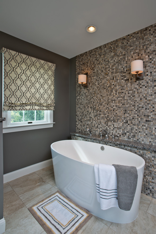Example of a master multicolored tile and mosaic tile ceramic tile freestanding bathtub design in Philadelphia with gray walls
