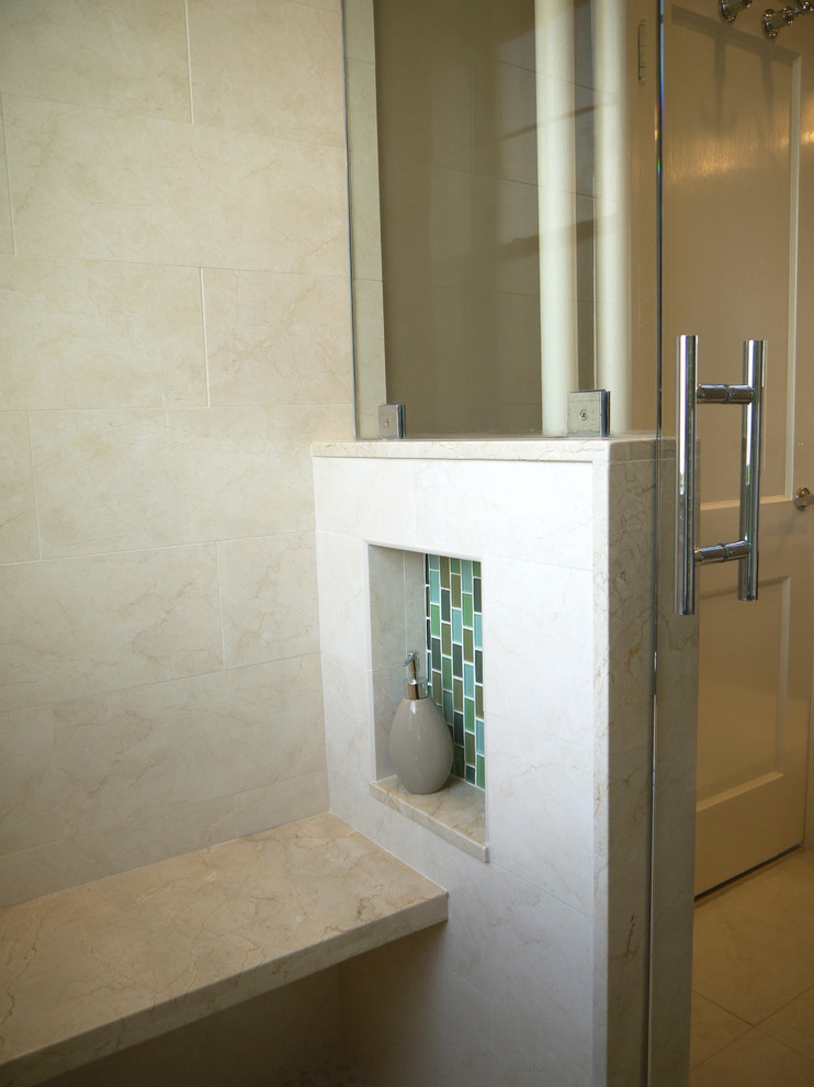 Example of a small transitional master beige tile and porcelain tile alcove shower design in Boston with flat-panel cabinets, dark wood cabinets, marble countertops and a two-piece toilet