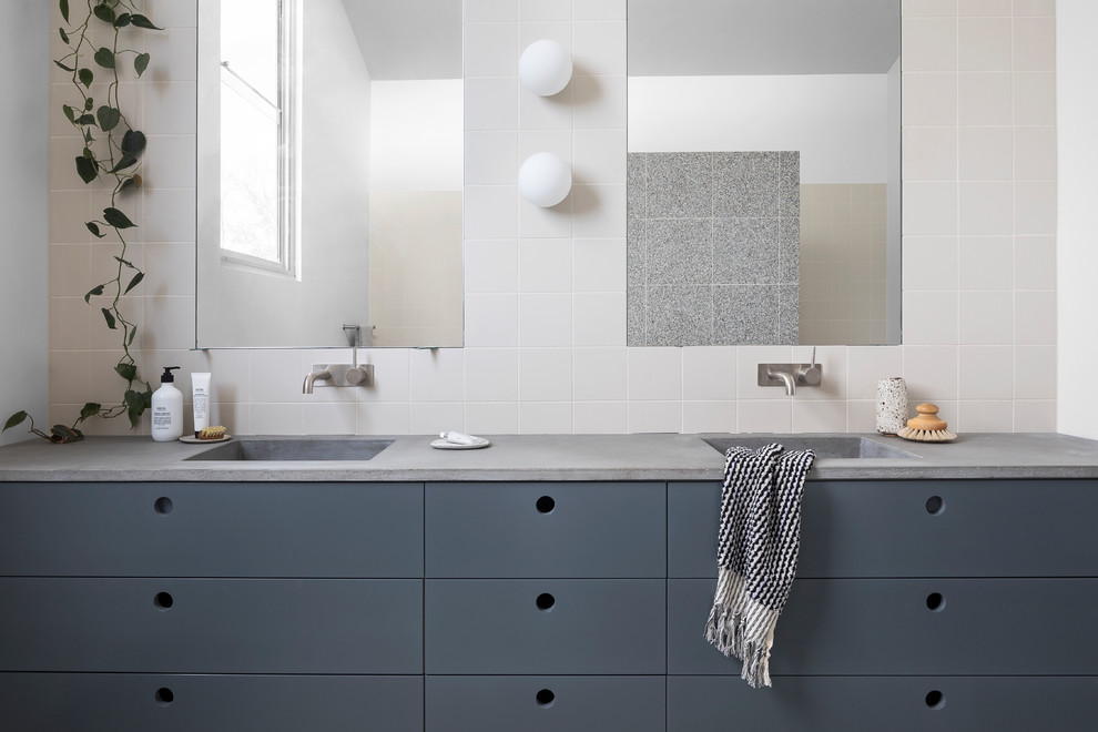 Example of a large trendy kids' terrazzo floor bathroom design in Melbourne with concrete countertops and gray countertops