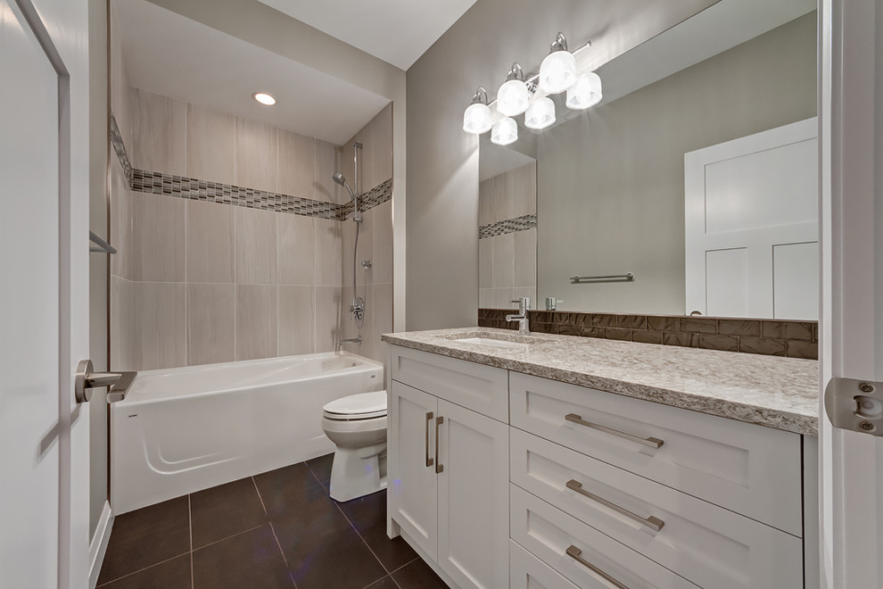 Traditional bathroom in Calgary with shaker cabinets, white cabinets, engineered stone worktops, grey tiles, porcelain tiles, grey walls and porcelain flooring.