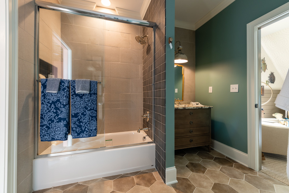Example of a mid-sized transitional kids' porcelain tile and gray tile porcelain tile and beige floor bathroom design in Other with an undermount sink, granite countertops, brown cabinets, green walls, beige countertops and flat-panel cabinets
