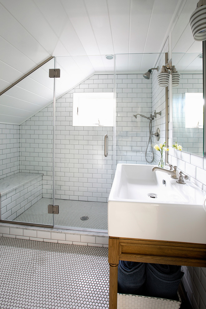 Example of a small eclectic ceramic tile medium tone wood floor double shower design in New York with a console sink, furniture-like cabinets, medium tone wood cabinets and white walls