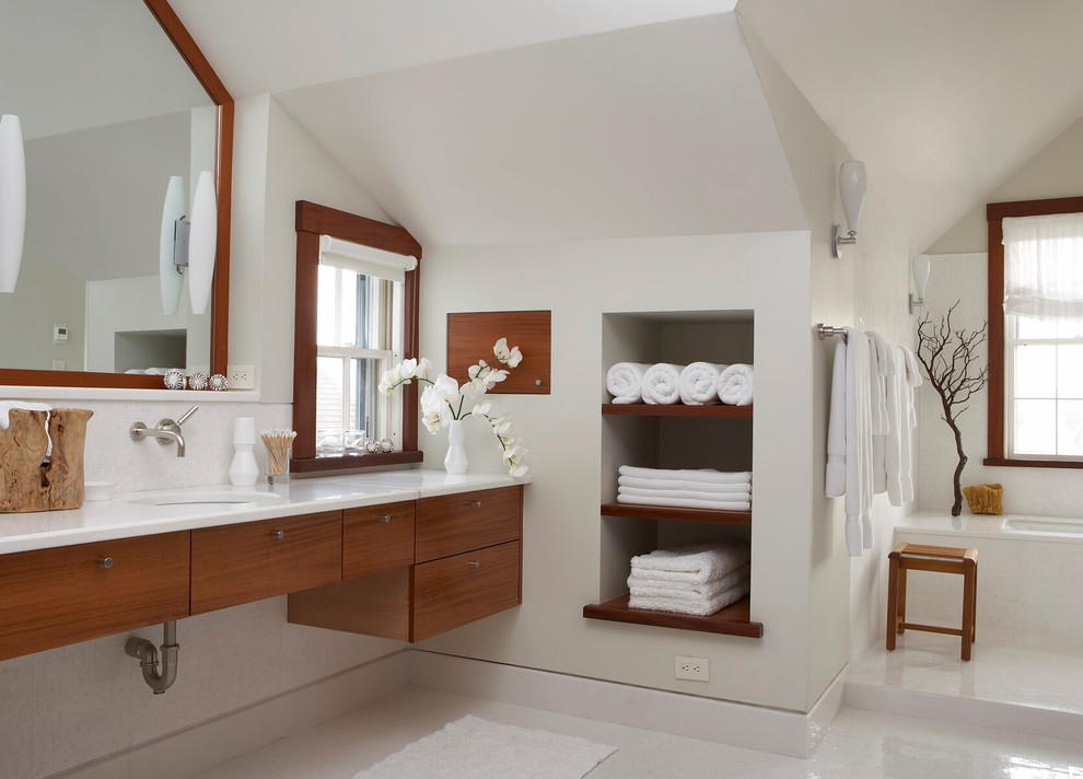 Inspiration for a nautical bathroom in Providence with flat-panel cabinets and medium wood cabinets.