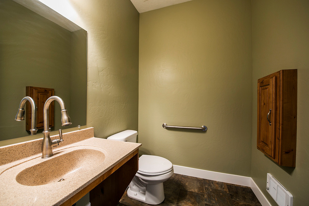 Photo of a medium sized traditional bathroom in Salt Lake City with raised-panel cabinets, medium wood cabinets, laminate worktops, green walls and ceramic flooring.
