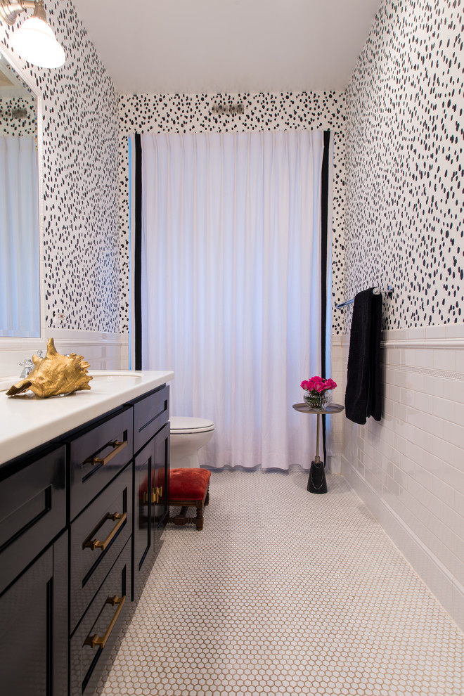 Inspiration for a classic bathroom in Chicago with shaker cabinets, black cabinets, a two-piece toilet, white tiles, metro tiles, white walls, mosaic tile flooring, a submerged sink, beige floors and a shower curtain.