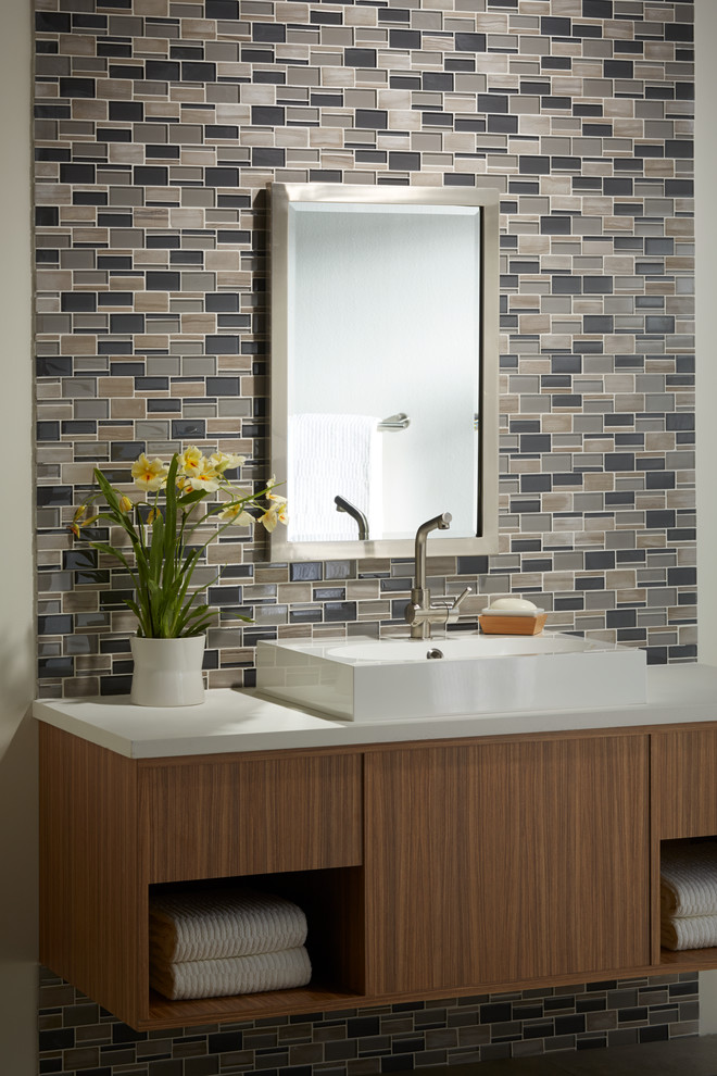 Bathroom - contemporary 3/4 glass tile, beige tile, black tile, brown tile and multicolored tile porcelain tile bathroom idea in Boise with flat-panel cabinets, medium tone wood cabinets, a two-piece toilet, multicolored walls, a vessel sink and quartz countertops