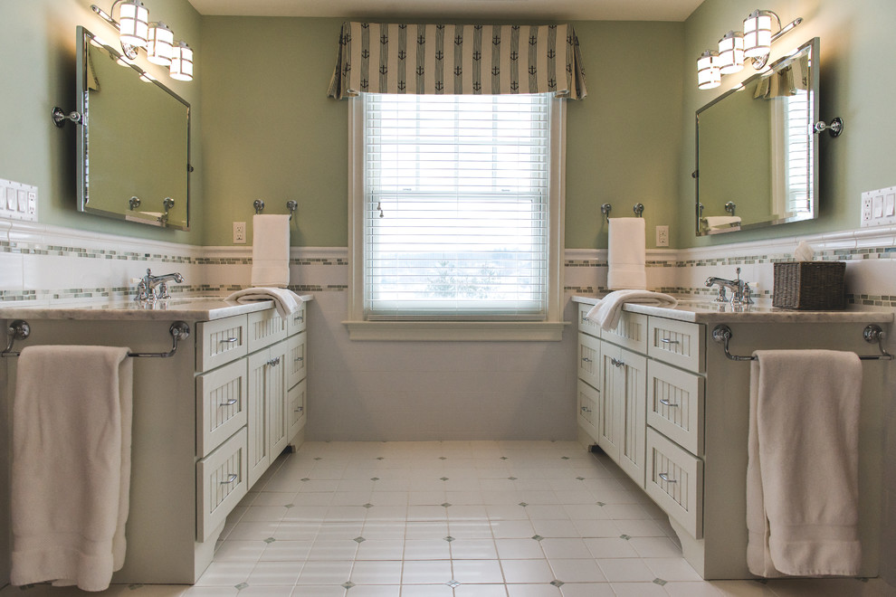 Example of a large transitional kids' white tile and ceramic tile porcelain tile and white floor bathroom design in New York with beaded inset cabinets, white cabinets, green walls, an undermount sink and quartz countertops
