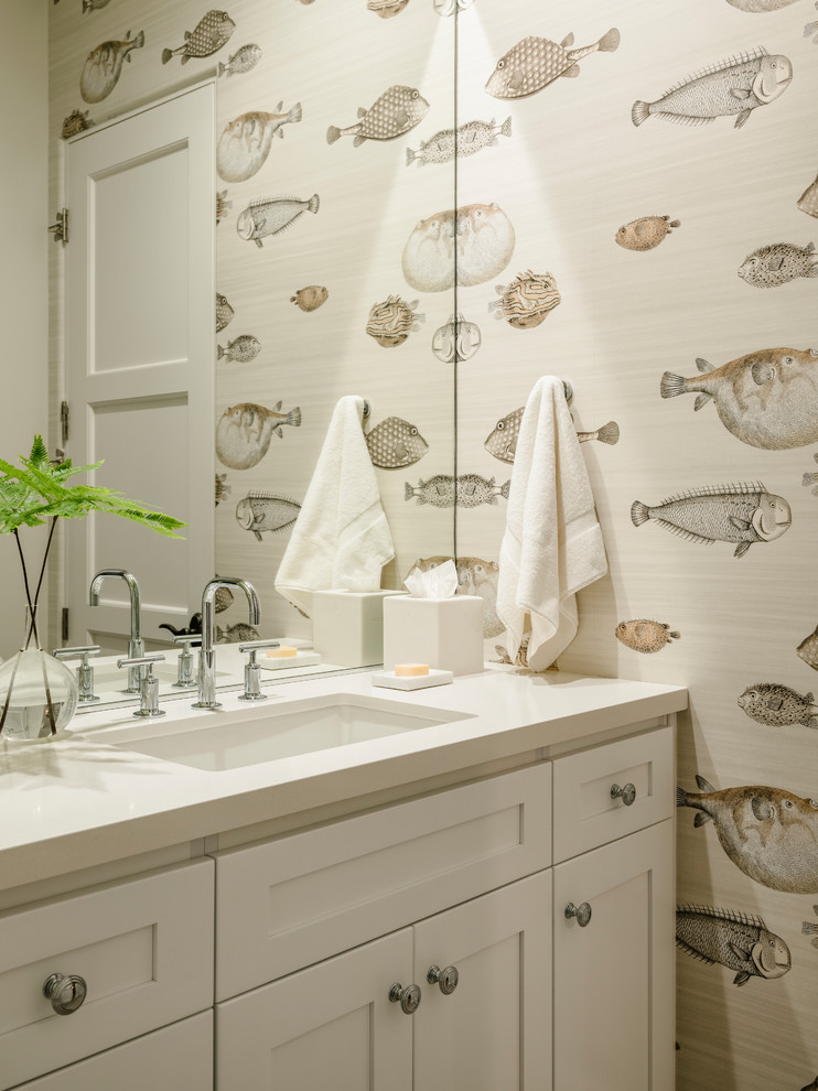 This is an example of a small beach style family bathroom in Los Angeles with shaker cabinets, white cabinets, a submerged sink, engineered stone worktops, white worktops and beige walls.