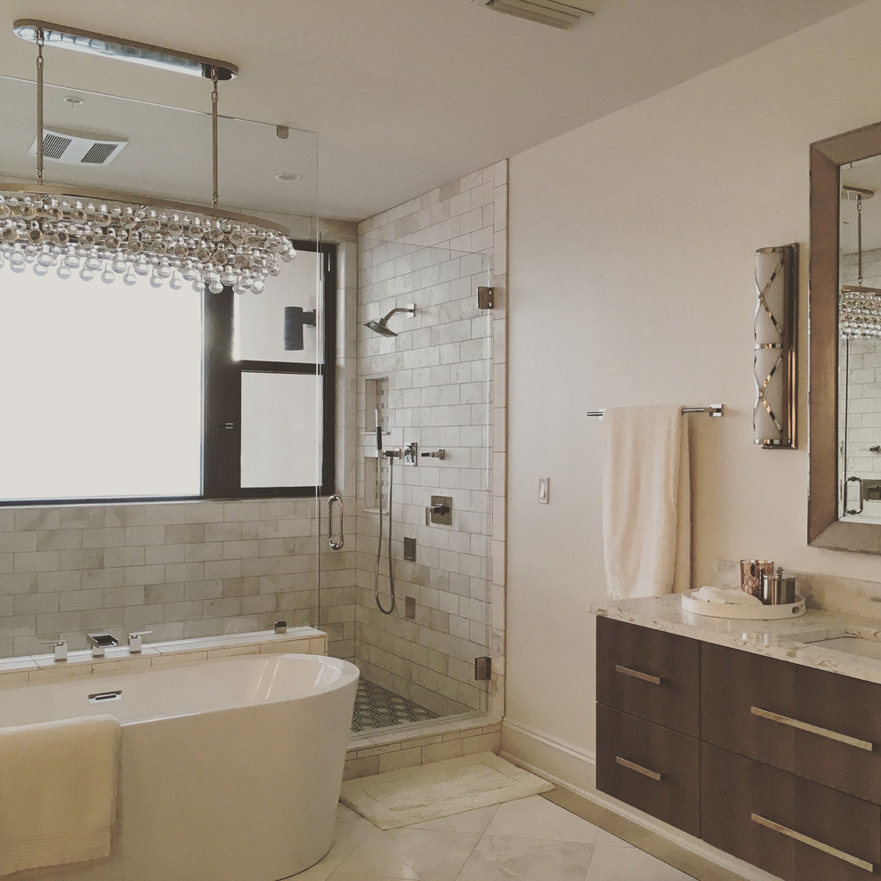 Inspiration for a medium sized contemporary ensuite bathroom in Other with flat-panel cabinets, grey cabinets, a freestanding bath, a double shower, a two-piece toilet, white tiles, travertine tiles, white walls, travertine flooring, a submerged sink, quartz worktops, beige floors and a hinged door.