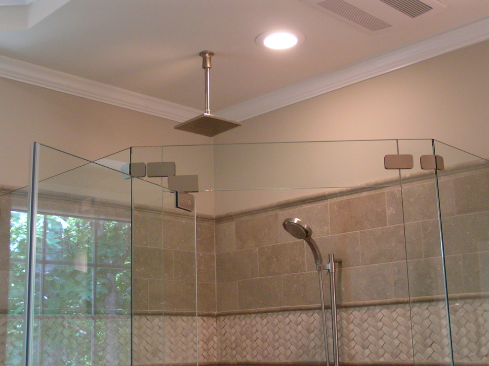 Example of a trendy master black tile and ceramic tile ceramic tile corner shower design in Atlanta with shaker cabinets, dark wood cabinets, an undermount tub, beige walls, an undermount sink and solid surface countertops