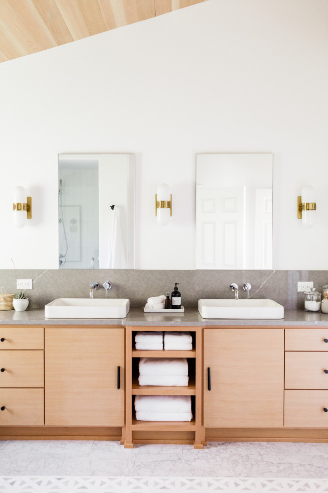 Large minimalist master white tile and ceramic tile mosaic tile floor and gray floor bathroom photo in Portland with flat-panel cabinets, medium tone wood cabinets, white walls, a drop-in sink, quartz countertops, a hinged shower door and gray countertops