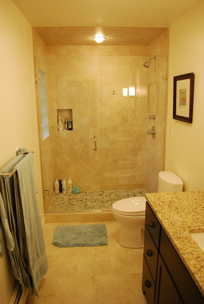Example of a mid-sized minimalist beige tile and ceramic tile ceramic tile doorless shower design in Boston with an undermount sink, furniture-like cabinets, black cabinets, granite countertops, a two-piece toilet and white walls