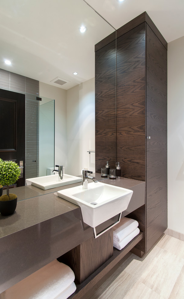 Photo of a contemporary bathroom in Vancouver with open cabinets, dark wood cabinets and ceramic flooring.