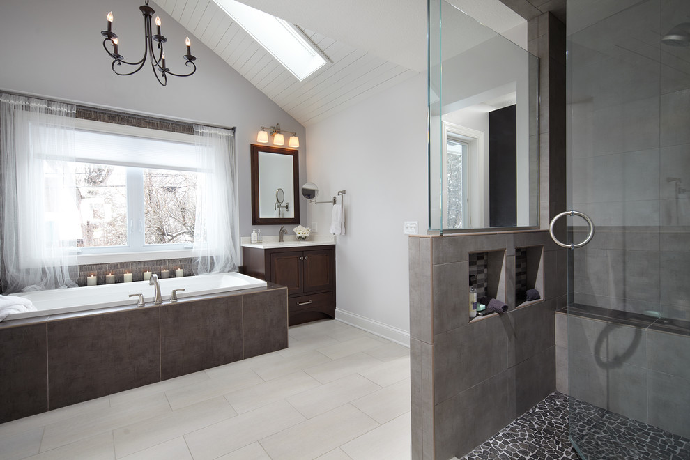 Inspiration for a timeless master bathroom remodel in Minneapolis with an undermount sink, dark wood cabinets and quartz countertops