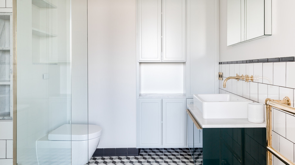 Medium sized scandi ensuite bathroom in Other with flat-panel cabinets, green cabinets, a wall mounted toilet, white tiles, marble tiles, white walls, porcelain flooring, a console sink, marble worktops, multi-coloured floors, white worktops, a walk-in shower and an open shower.