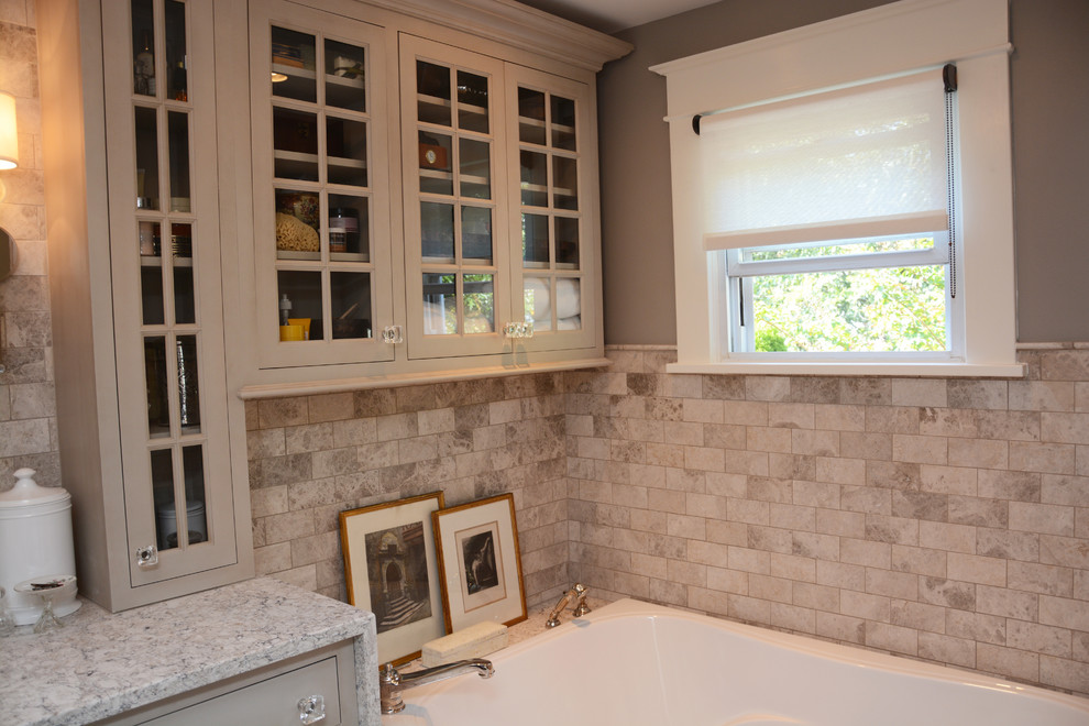 Inspiration for a mid-sized cottage master beige tile corner shower remodel in Baltimore with recessed-panel cabinets, beige cabinets, a hot tub, an undermount sink and quartz countertops