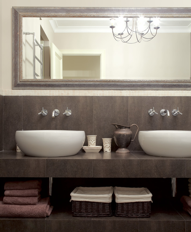 Inspiration for a transitional bathroom remodel in Moscow with a vessel sink