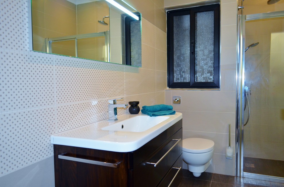 Example of a trendy bathroom design in Other with an integrated sink