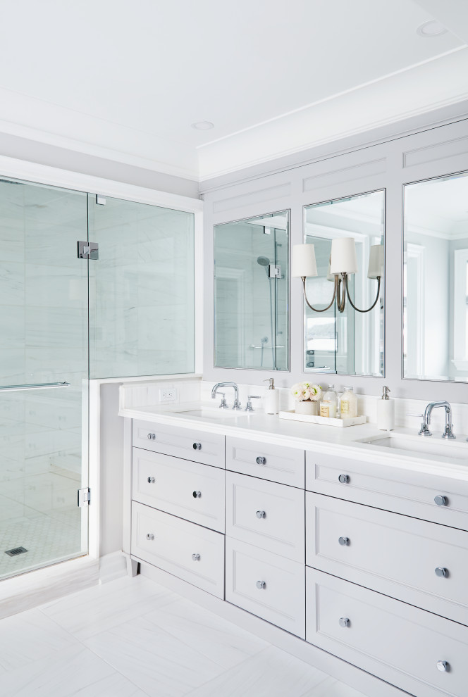Example of a large transitional 3/4 porcelain tile, gray floor and double-sink alcove shower design in Toronto with recessed-panel cabinets, gray cabinets, gray walls, an undermount sink, a hinged shower door, white countertops and a built-in vanity