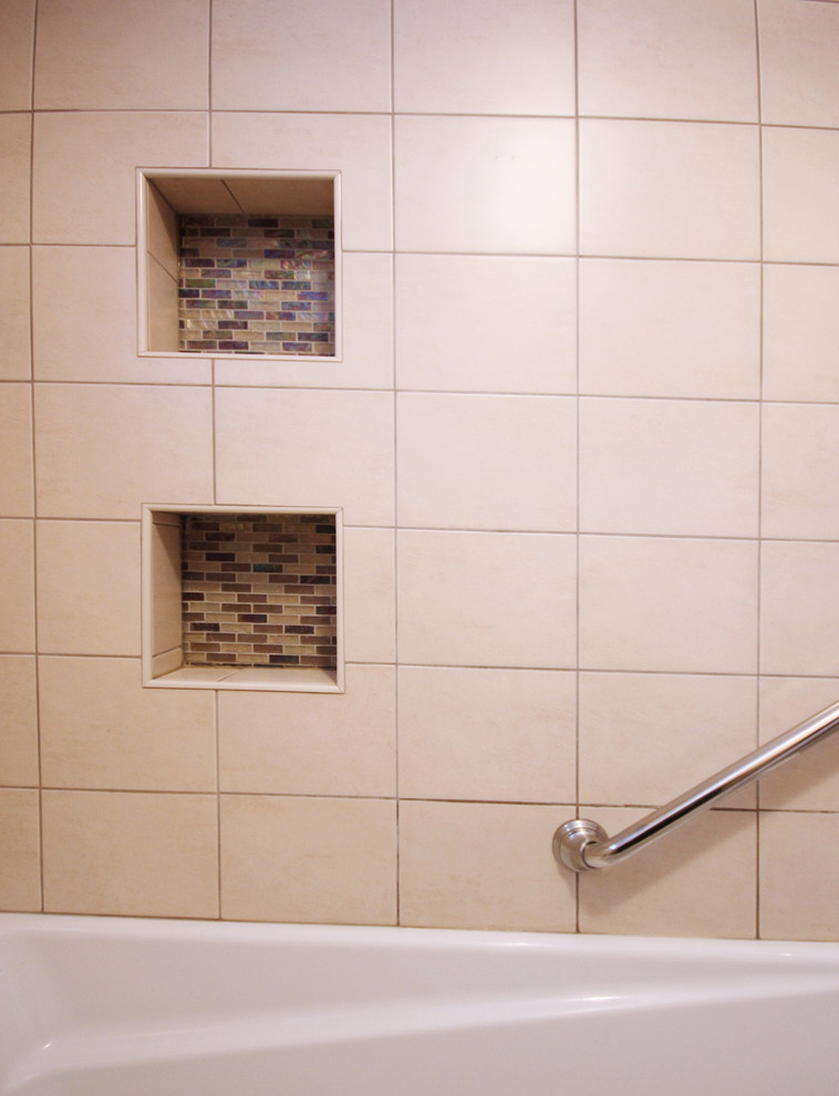 Example of a mid-sized minimalist master brown tile and ceramic tile ceramic tile bathroom design in Ottawa with an undermount sink, flat-panel cabinets, brown cabinets, granite countertops, a two-piece toilet and yellow walls