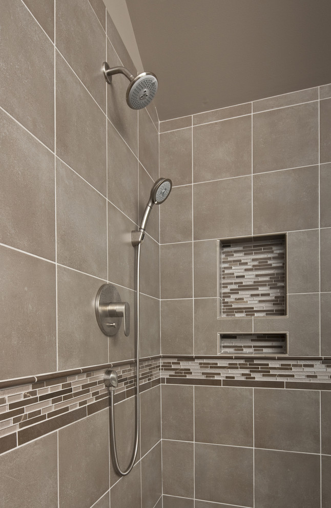 Example of a large trendy beige tile, brown tile, gray tile and matchstick tile ceramic tile bathroom design in Seattle with shaker cabinets, dark wood cabinets, gray walls and an undermount sink