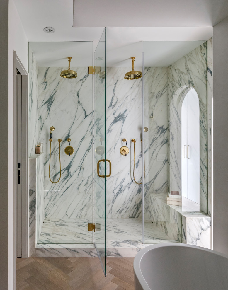 Bathroom - contemporary master marble floor and double-sink bathroom idea in New York with flat-panel cabinets, an undermount sink, marble countertops, a hinged shower door and a built-in vanity