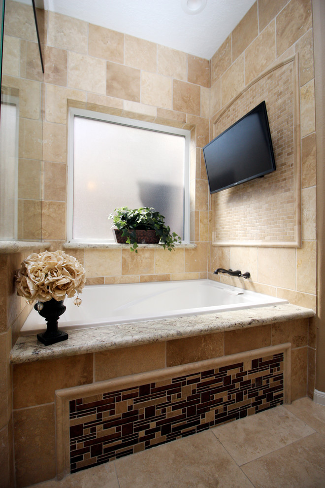 Bathroom - large traditional master beige tile and travertine tile travertine floor and beige floor bathroom idea in Houston with beige walls, granite countertops, a hinged shower door and beige countertops