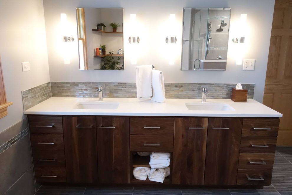 Example of a large transitional master beige tile, white tile and ceramic tile ceramic tile and gray floor bathroom design in Chicago with raised-panel cabinets, dark wood cabinets, a one-piece toilet, beige walls and a drop-in sink