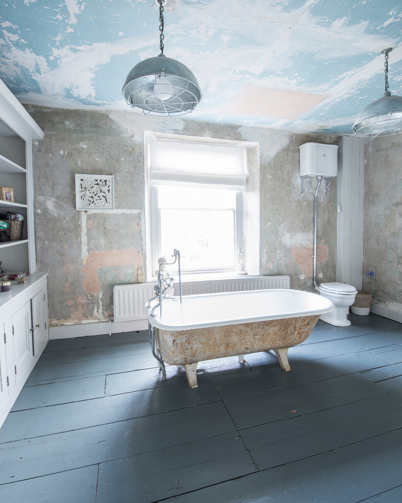 Photo of a large shabby-chic style family bathroom in Other with open cabinets, grey cabinets, a freestanding bath, a two-piece toilet, dark hardwood flooring, wooden worktops, grey floors and an open shower.