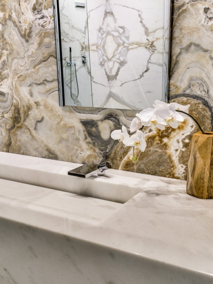 Inspiration for a classic ensuite bathroom in Dallas with marble worktops, a built-in shower, a one-piece toilet, grey walls, concrete flooring and a wall-mounted sink.