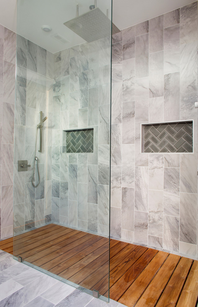 Doorless shower - mid-sized zen master gray tile and porcelain tile porcelain tile doorless shower idea in Birmingham with gray walls, flat-panel cabinets, light wood cabinets, a one-piece toilet, a vessel sink and wood countertops