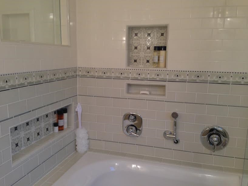 Inspiration for a timeless green tile ceramic tile bathroom remodel in San Diego with marble countertops