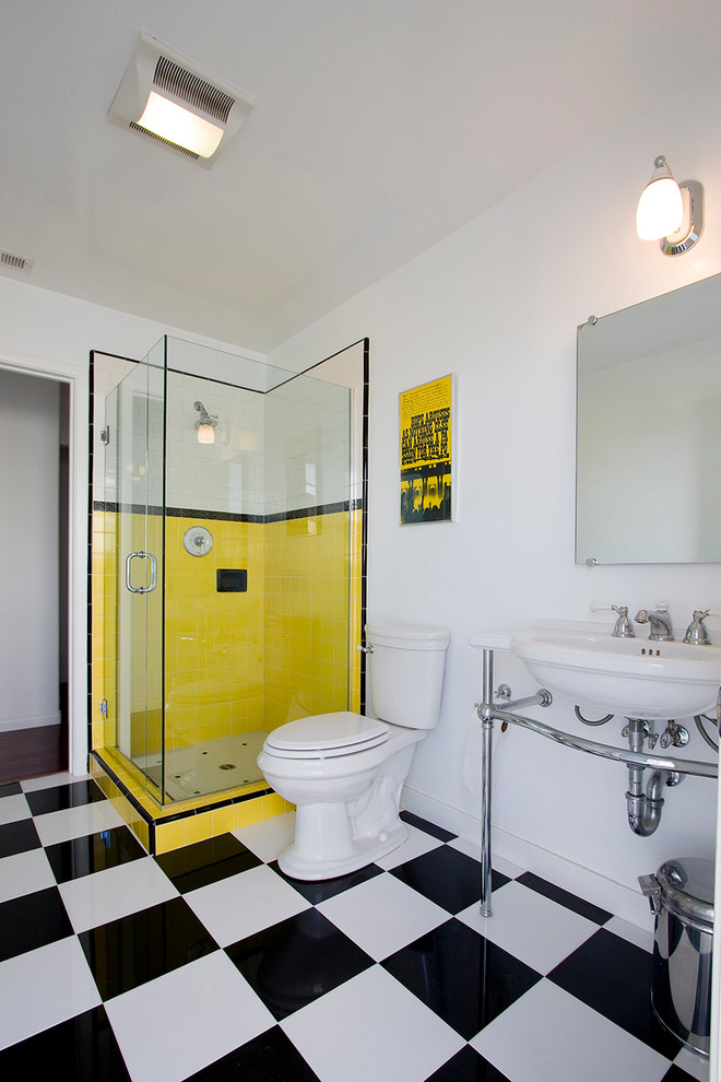 Example of a mid-sized eclectic 3/4 yellow tile and ceramic tile ceramic tile corner shower design in San Diego with a wall-mount sink, a two-piece toilet and white walls