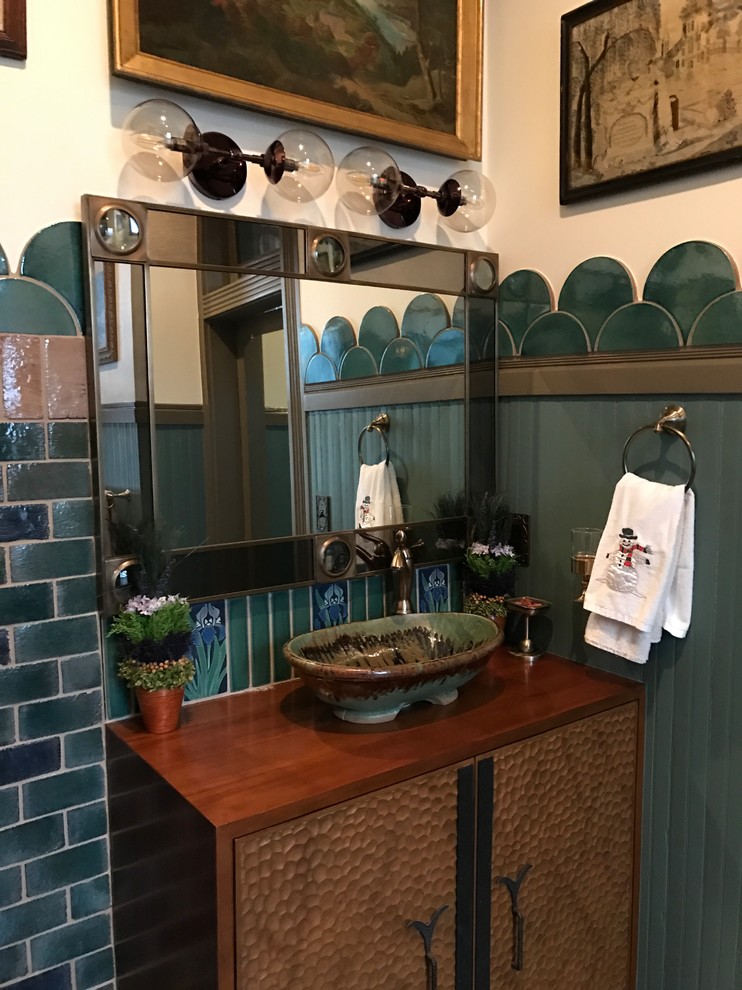 Mid-sized elegant master blue tile, green tile, multicolored tile and ceramic tile porcelain tile and multicolored floor bathroom photo in Nashville with furniture-like cabinets, a wall-mount toilet, multicolored walls, marble countertops, a hinged shower door, gray cabinets and an undermount sink
