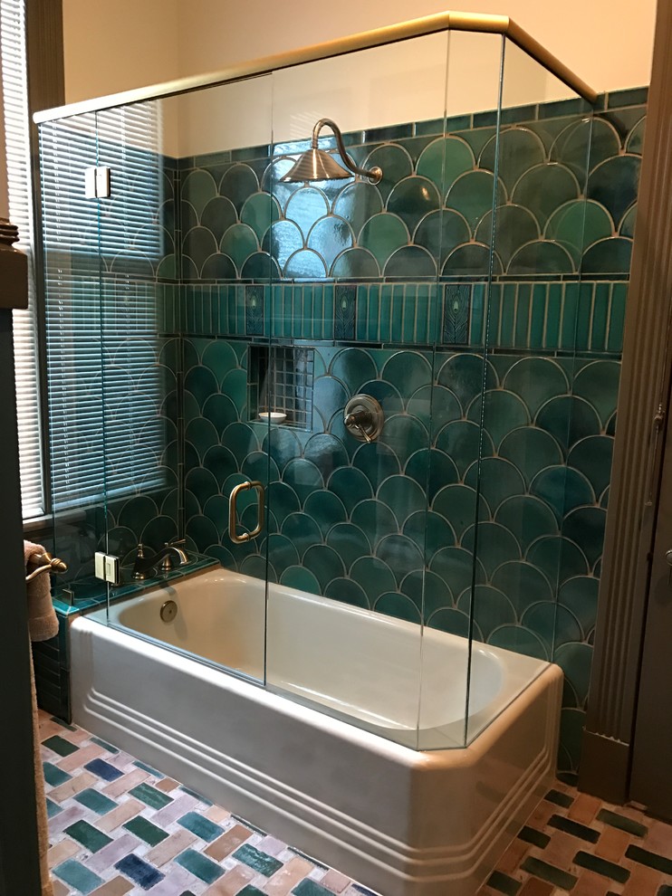 Mid-sized elegant master blue tile, green tile, multicolored tile and ceramic tile porcelain tile and multicolored floor bathroom photo in Nashville with furniture-like cabinets, a wall-mount toilet, multicolored walls, marble countertops, a hinged shower door, gray cabinets and an undermount sink