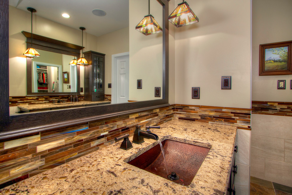 Example of a huge arts and crafts master multicolored tile and porcelain tile ceramic tile bathroom design in St Louis with shaker cabinets, dark wood cabinets, a one-piece toilet, beige walls, an undermount sink and quartzite countertops