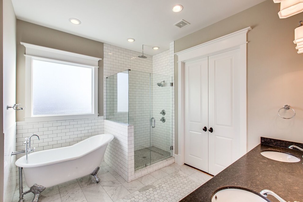 Example of a large ornate master white tile and subway tile marble floor and gray floor bathroom design in Houston with recessed-panel cabinets, white cabinets, an undermount sink, granite countertops, a two-piece toilet, gray walls and a hinged shower door