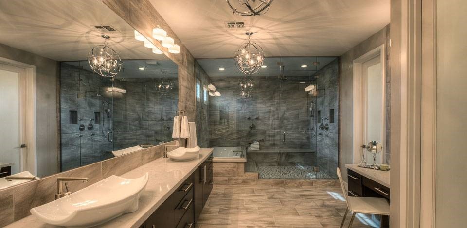 Design ideas for a large traditional ensuite bathroom in Phoenix with a vessel sink, flat-panel cabinets, dark wood cabinets, quartz worktops, a built-in bath, grey tiles, ceramic tiles, grey walls and ceramic flooring.