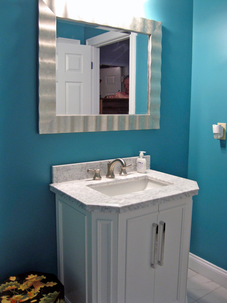 Mid-sized 3/4 white tile and porcelain tile porcelain tile bathroom photo in Boston with beaded inset cabinets, white cabinets, marble countertops, a two-piece toilet, a vessel sink and blue walls