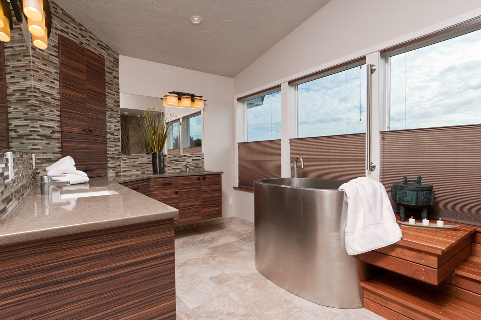 Inspiration for a large asian master multicolored tile and porcelain tile porcelain tile bathroom remodel in Seattle with an undermount sink, flat-panel cabinets, dark wood cabinets, quartz countertops, a two-piece toilet and gray walls