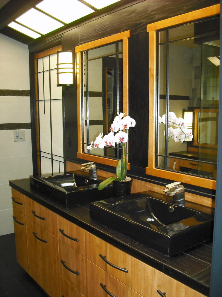 Asian style bathroom lights, counter, mirrors, doors all