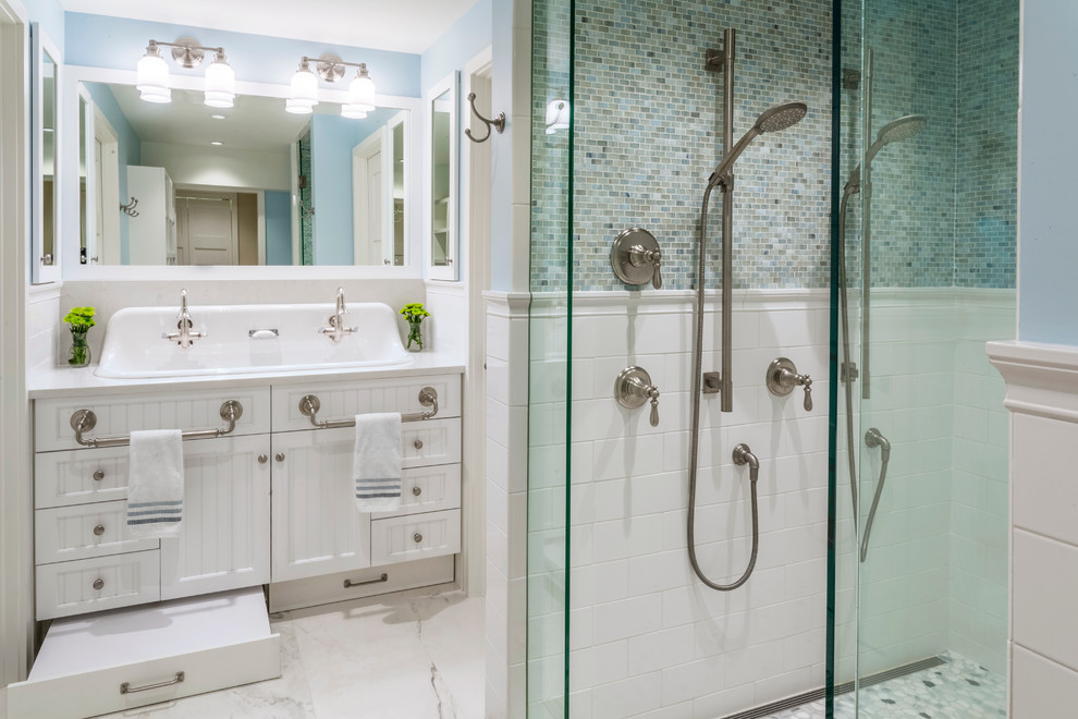 Large traditional family bathroom in Denver with shaker cabinets, white cabinets, a double shower, white tiles, porcelain tiles, blue walls, pebble tile flooring, a trough sink and engineered stone worktops.