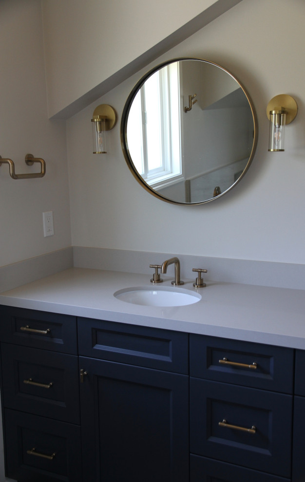 Medium sized traditional grey and white ensuite bathroom in San Francisco with shaker cabinets, blue cabinets, a submerged sink, engineered stone worktops, grey worktops, double sinks, a built in vanity unit and grey walls.